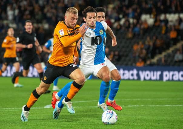 On the attack: Jarrod Bowen goes forward as Lewis Travis chases him down.
  Picture: Bruce Rollinson
