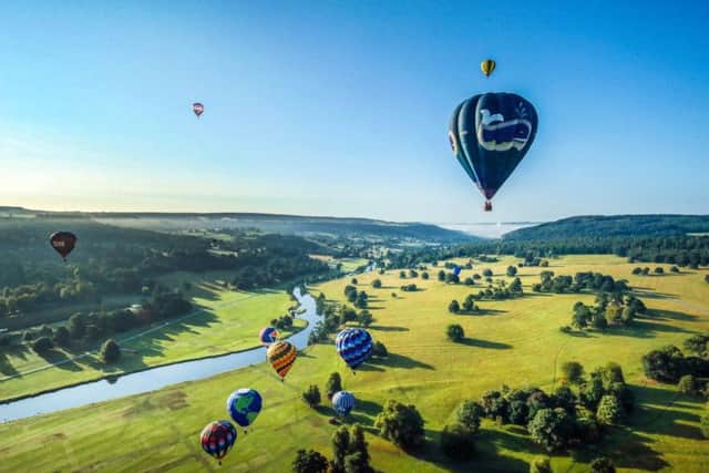 Hot air balloons over Chatsworth Park and the River Derwent during the Chatsworth Country Fair last year. Picture: Danny Lawson/PA Wire