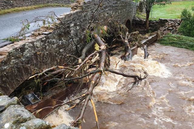 Debris clogging a watercourse at Whaw in Arkengarthdale following flash flooding on July 30. Picture courtesy of Arkengarthdale Parish Council.