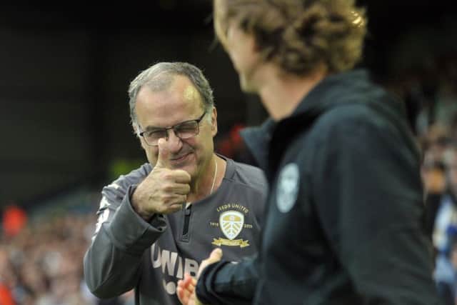 NICE ONE: Leeds United manager Marcelo Bielsa greets his opposite number, Brentford's Thomas Frank.  Picture Tony Johnson.