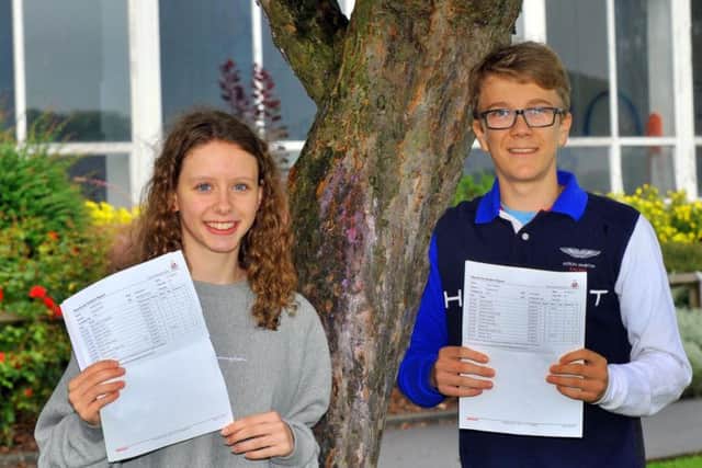Christa Wilson and Toby Redfern celebrated top GCSE results today