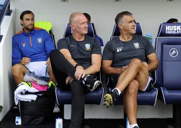 Sheffield Wednesday caretaker boss Lee Bullen sits alongside assistant Neil Thompson during the reecnt game at Millwall. Picture: Steve Ellis