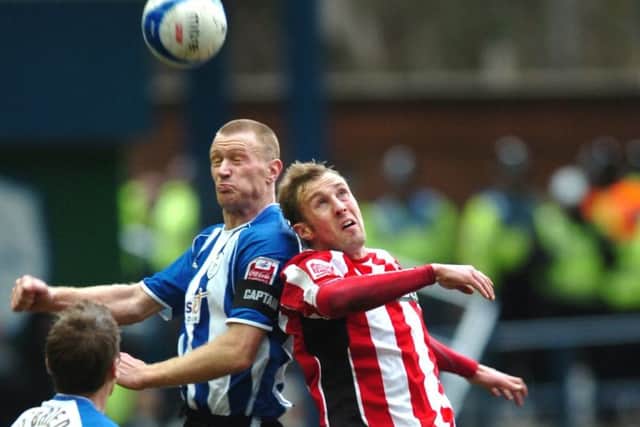 NATURAL LEADER: Lee Bullen battles with Sheffield United's Rob Hulse during a Steel City derby.