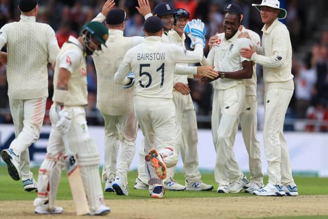 England's Jofra Archer (second right) celebrates taking the wicket of Australia's Matthew Wade.