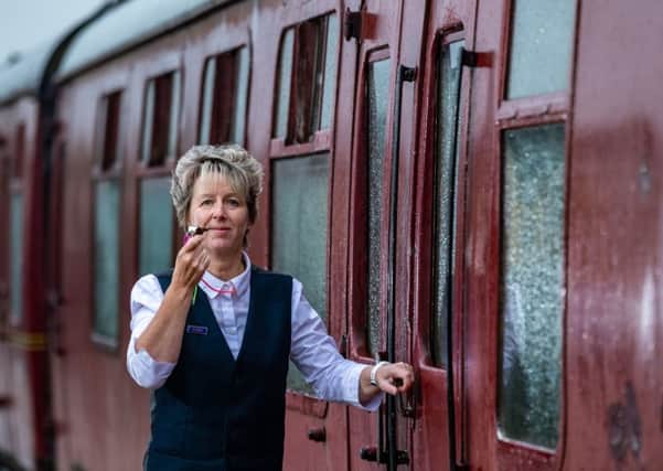 Sue Threadgold is a volunteer guard on the Wensleydale Railway.