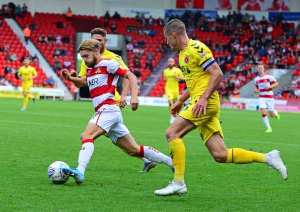 Doncaster's Alfie May: Backed by his manager.