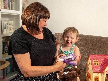 Connie Annakin, with mum Caroline Day, is too young at three to understand what is happening and is oblivious to the impact on her family.