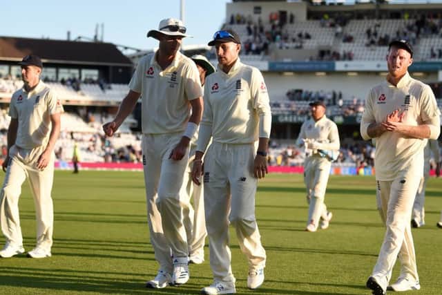 BELIEVE: Stuart Broad, Joe Root and Ben Stokes leave the field at stumps after a desperately disappointing day two at Headingley. Picture: Gareth Copley/Getty Images