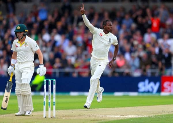 DANGER MAN: England's Jofra Archer (centre) celebrates taking the wicket of Australia's Marcus Harris on day one at Headingley. Picture: Mike Egerton/PA