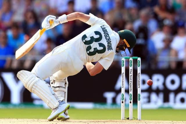 Australia's Marnus Labuschagne is struck on the helmet by the ball following a delivery from England's Jofra Archer at Headingley. Picture: Mike Egerton/PA