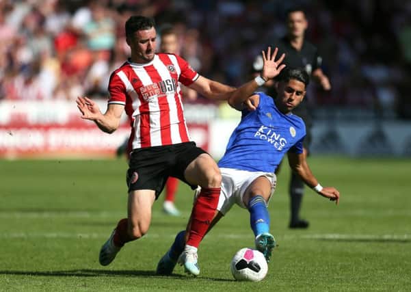 Sheffield United's George Baldock (left) and Leicester City's Ayoze Perez at Bramall Lane. Picture: Richard Sellers/PA