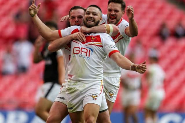 Sheffield Eagles'  Corey Makelim celebrates scoring a try during the 1895 Cup Final at Wembley. Picture: Paul Harding/PA