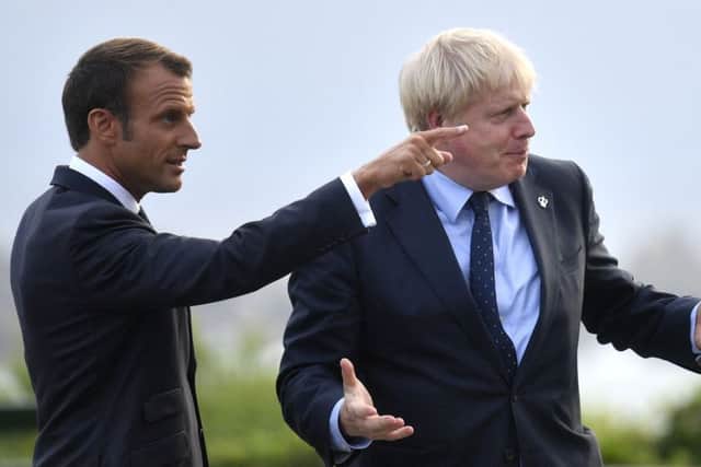 Boris Johnson with Emmanuel Macron, the president of France.