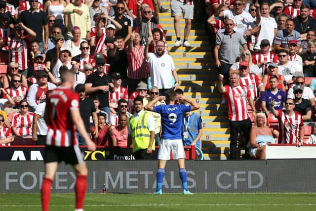 Arch enemy: Sheffield Wednesday fan Jamie Vardy taunts the Blades fans after putting Leicester ahead.