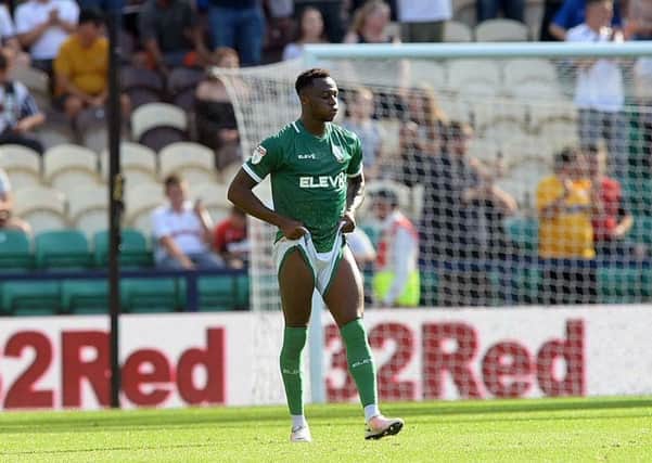 Bad day: Defender Moses Odubajo conceded two penalties. Picture: Steve Ellis