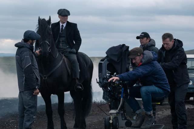 Behind-the-scenes on the set of Peaky Blinders, featuring Tommy Shelby, played by Cillian Murphy riding a horse. Picture courtesy of BBC/Caryn Mandabach Productions.