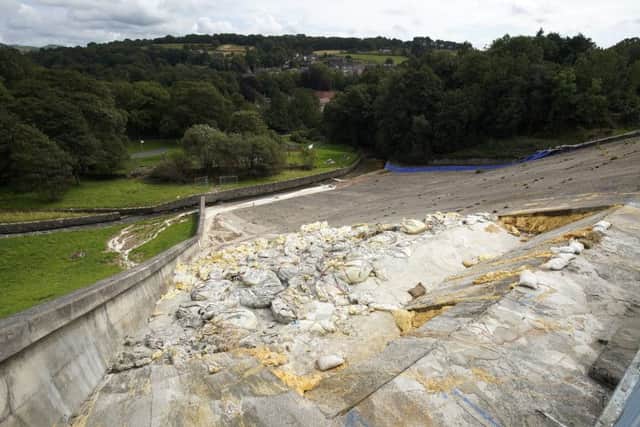Work continues at the Whaley Bridge Dam site to shore up the damaged dam wall at Toddbrook Reservoir.