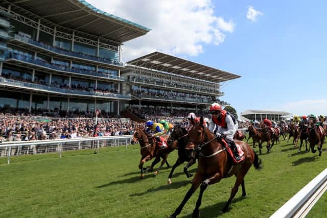 Copper Knight is pictured winning at York's Dante meeting under David Allan.