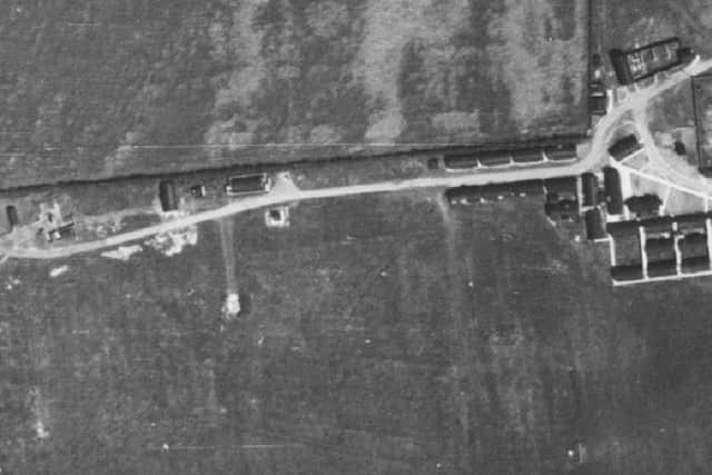 An aerial shot of the guns and some Nissen huts taken in 1946