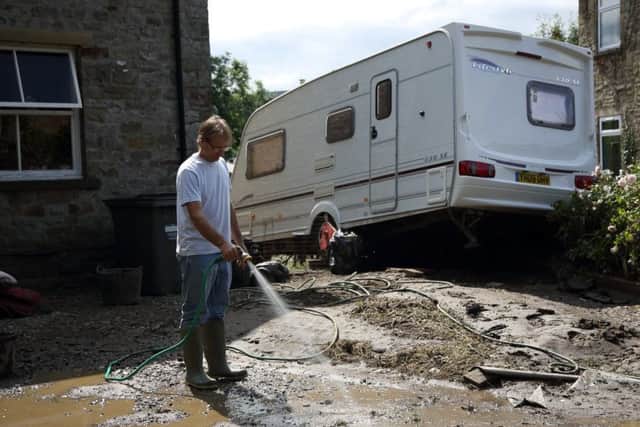 The aftermath of last month's floods in Reeth.