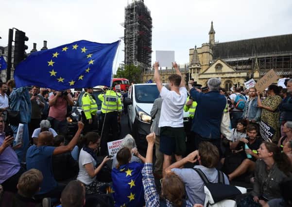 Protesters stop traffice outside the Houses of Parliament, London, as they demonstrate against Prime Minister Boris Johnson temporarily closing down the Commons from the second week of September until October 14 when there will be a Queen's Speech to open a new session of Parliament.