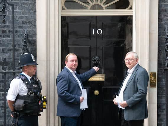 Adam and David Bradford delivered a petition to Number 10 calling for the prime minister to tackle online games that encourage gambling