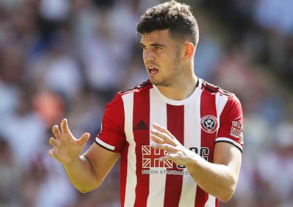 Getting to grips: John Egan is relishing the Premier League challenge with Sheffield United. (Picture: Simon Bellis/Sportimage)