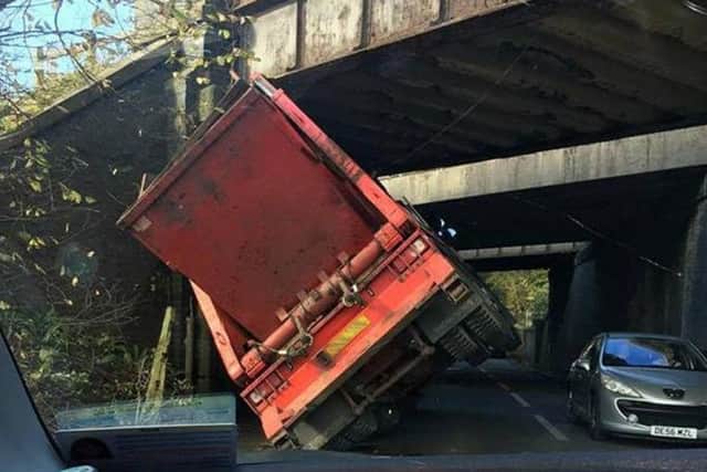 Bridge strikes by lorries have caused 'havoc and mayhem' in towns, councils say.