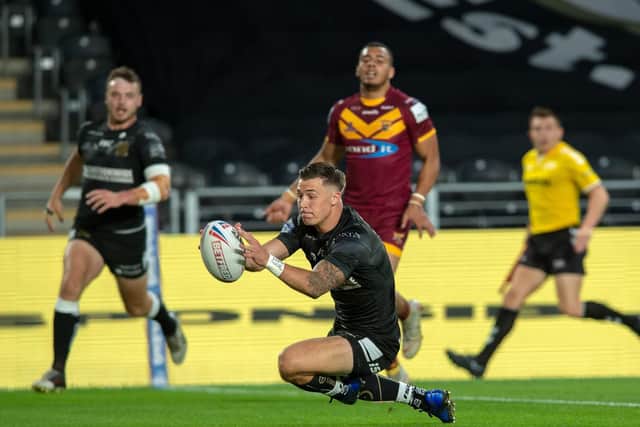 Jamie Shaul collects Jack Logan's kick to score Hull FC's first try. (PIC: BRUCE ROLLINSON)