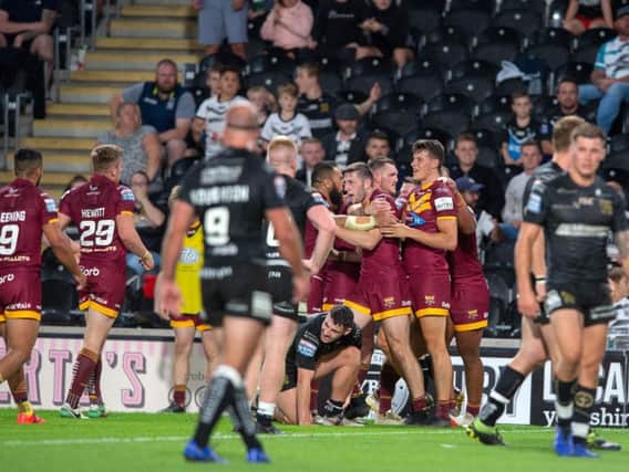 Huddersfield Giants' Louis Senior celebrates his try against Hull FC. (PIC:BRUCE ROLLINSON)