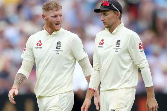 England's Ben Stokes (left) and Joe Root during day four of the Ashes Test (Picture: PA)