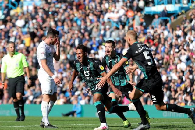 Winner: Swansea City's Wayne Routledge celebrates.