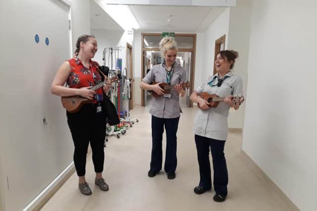 Staff having a ukulele break