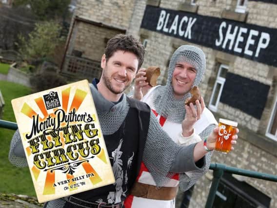 Black Sheep Managing director Rob Theakston (left) and marketing director Jo Theakston (right) dressed as knights from the Holy Grail film celebrate the 50th anniversary of Monty Python with the special Flying Circus cask beer.