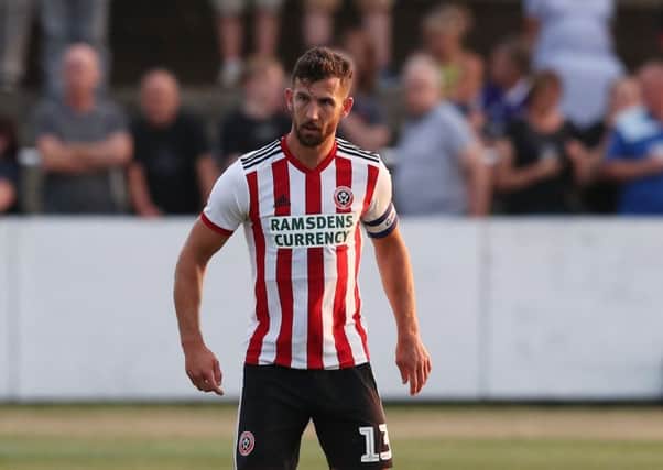 HEADING OUT: Sheffield United defender Jake Wright. Picture: Simon Bellis/Sportimage
