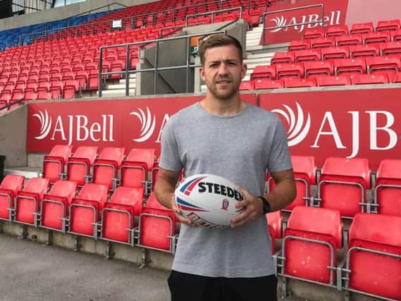 Chris Atkin signs for Salford Red Devils.