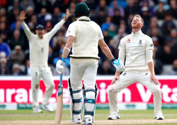England's Ben Stokes (right) reacts after an lbw appeal is rejected.
