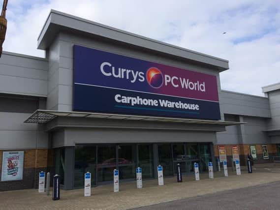 The Carphone Warehouse owner blamed a "challenging mobile market"