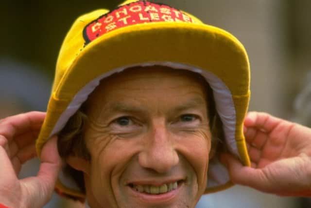 Lester Piggott donned the traditional cap - the prize given to the winning prize - when Commanche Run landed the 1984 St Leger.