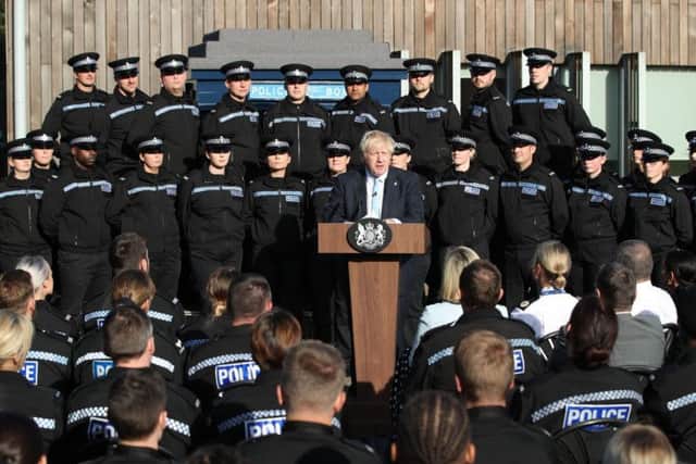 The Prime Minister's visit was tocoincide with the launch of a national campaign to recruit 20,000 extra police officers across England and Wales, but instead it turned into a political debate about Brexit.