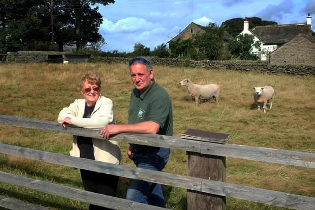 Robert Knowles pictured with his mother Cynthia Knowles on Ingfield Farm, Ingbirchworth. Picture by Simon Hulme.