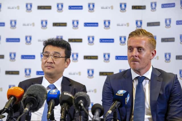 Garry Monk is unveiled as the new Sheffield Wednesday manager alongside chairman Dejphon Chansiri. Picture: Scott Merrylees
