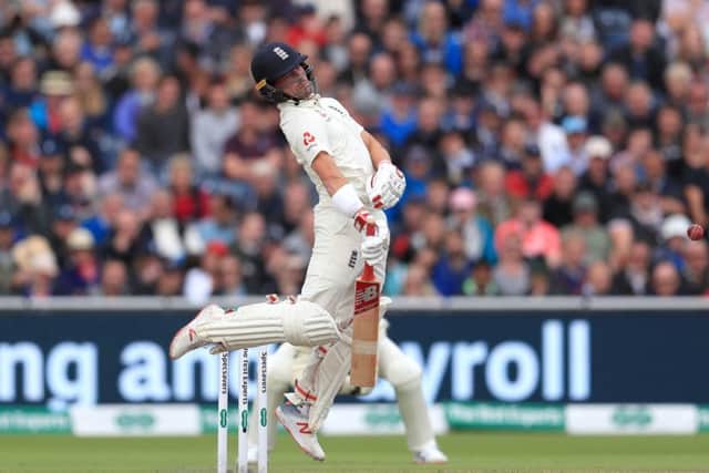England's Rory Burns avoids another short ball against Australia at Old Trafford. Picture: Mike Egerton/PA