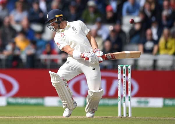 Rory Burns avoids a short ball from Mitchell Starc at Old Trafford. Picture: Gareth Copley/Getty Images)