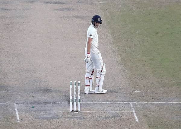 England's Joe Root looks dejected after being dismissed by Australia's Pat Cummins at Old Trafford. Picture: Martin Rickett/PA