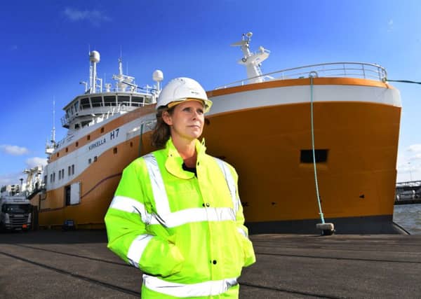 CEO of UK Fisheries Jane Sandell pictured in front of the Kirkella, at Hull Docks.