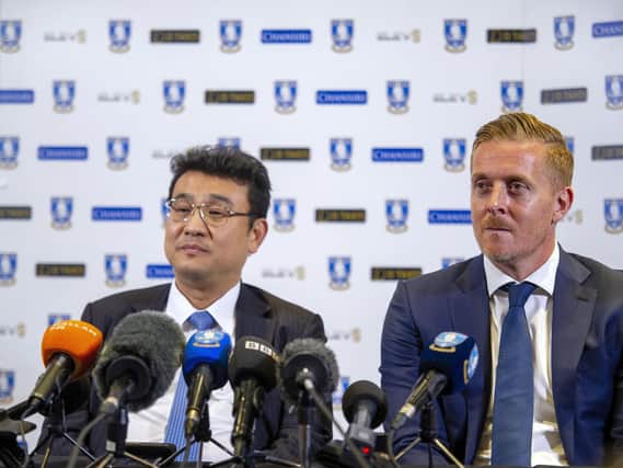 New Sheffield Wednesday manager Garry Monk (right), with chairman Dejphon Chansiri (left).