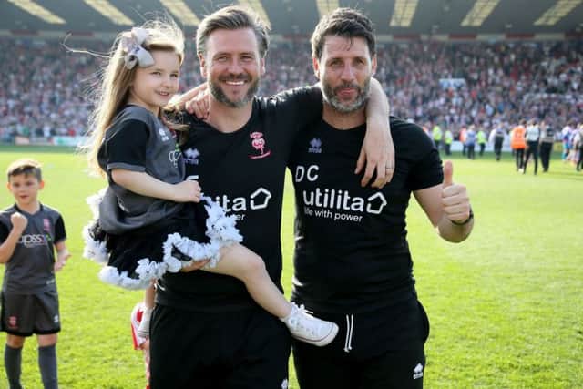 Lincoln City Manager Danny Cowley and assistant Nick Cowley celebrate winning the League Two title. Picture: Richard Sellers/PA