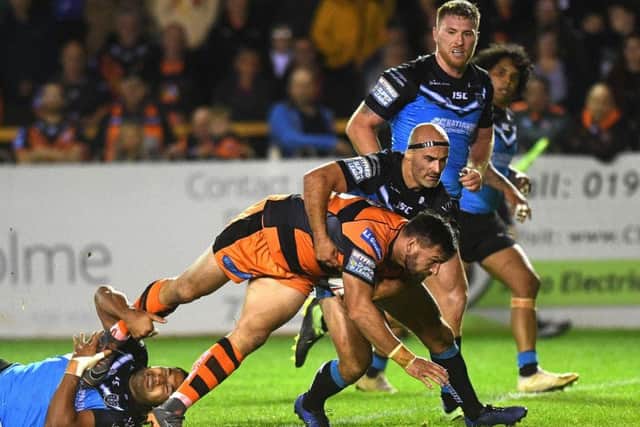 Castleford's Matt Cook takes it to the Hull FC defence. (PIC: JONATHAN GAWTHORPE)