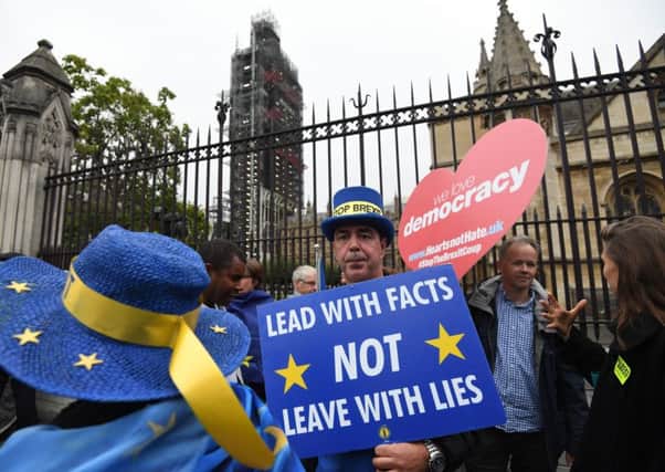Pro-EU supporters outside the Houses of Parliament.